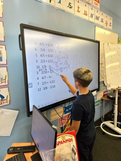 Tricky maths on the whiteboard! 